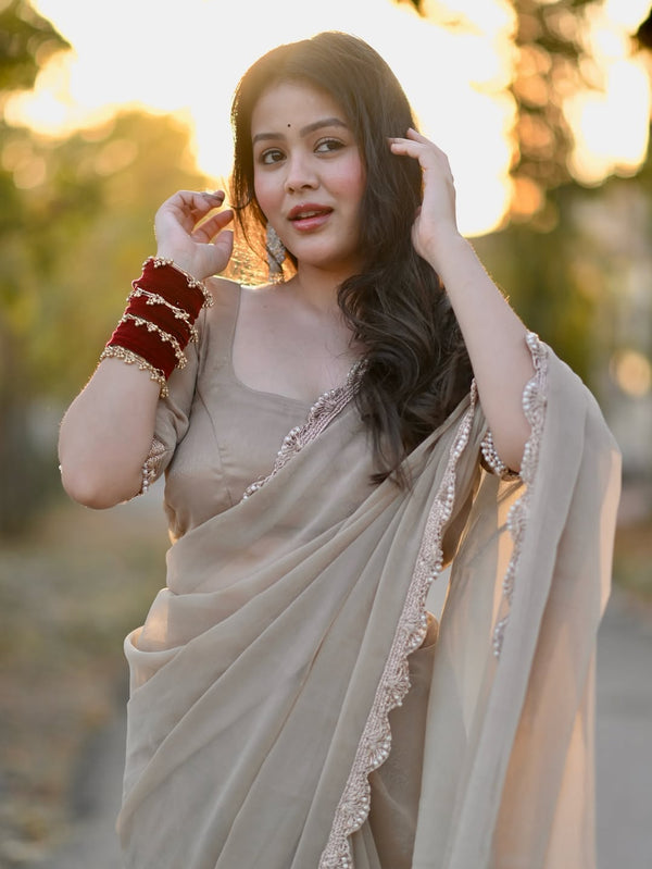 Glamorous Jimichu tissue Saree with Pearl Dori Lace