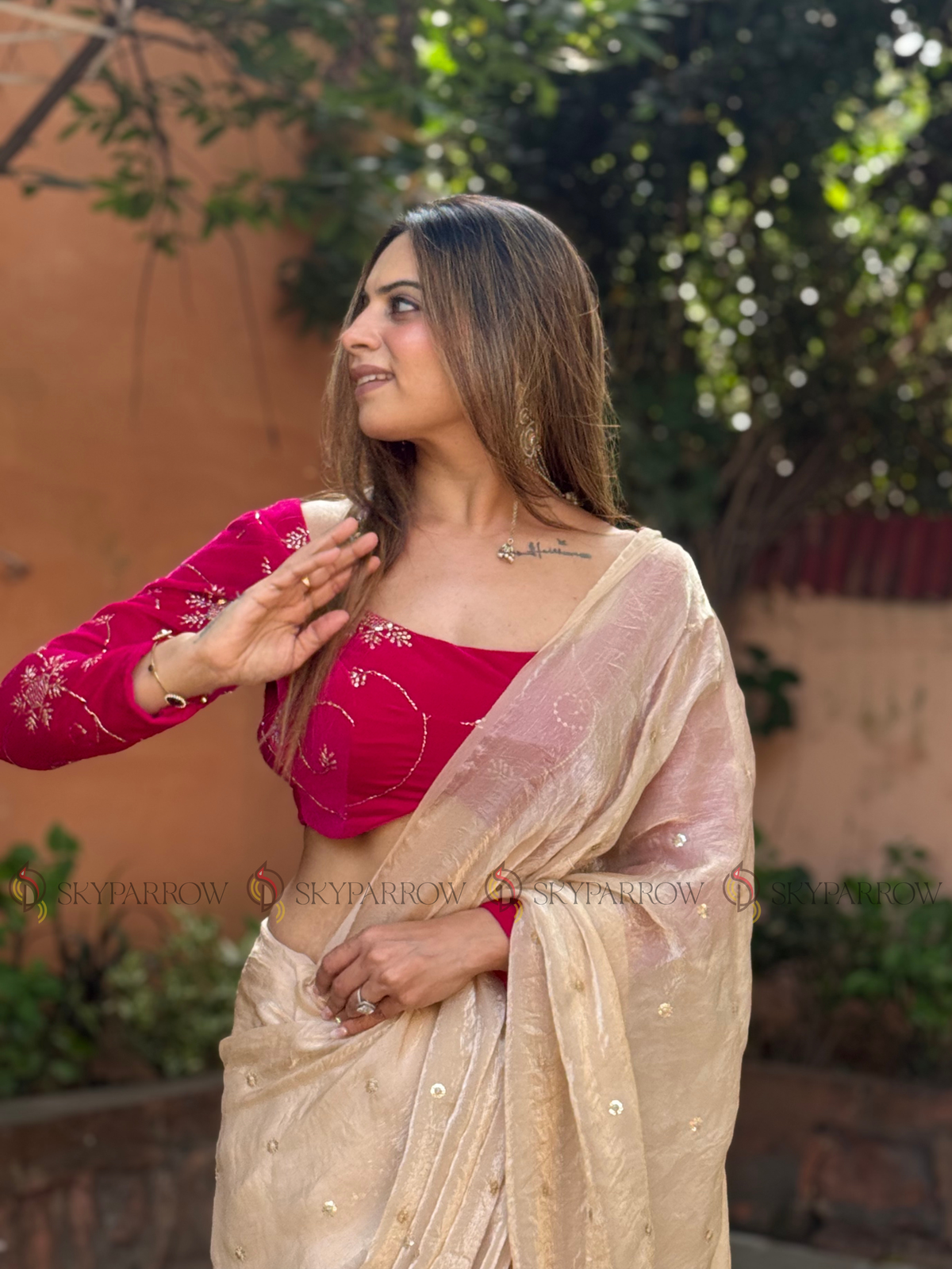 Premium Fendy Chiffon Saree with Allover Sequence Buti Buti & Tassel Border