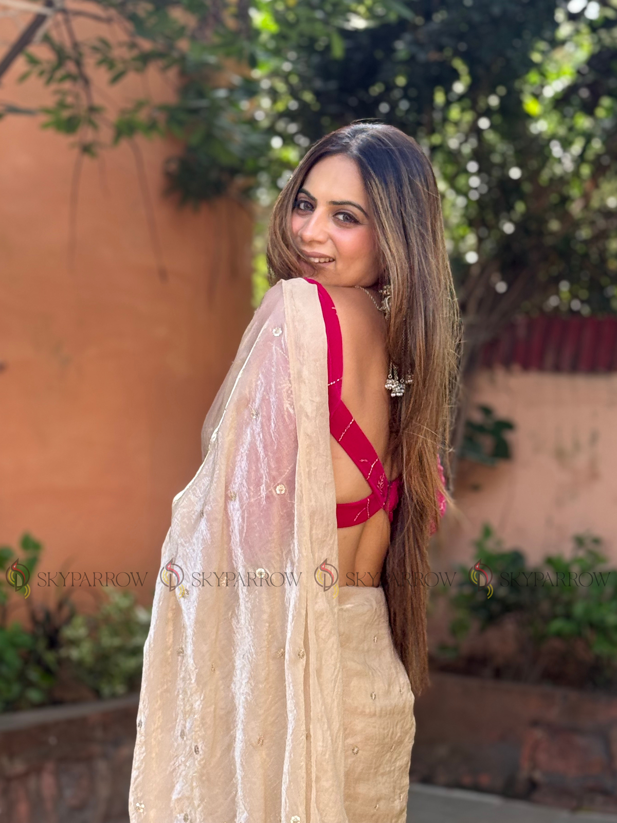 Premium Fendy Chiffon Saree with Allover Sequence Buti Buti & Tassel Border