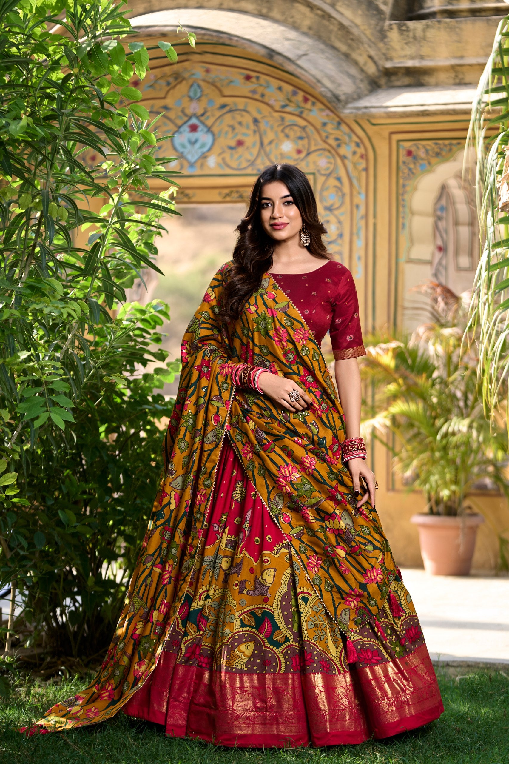 Red Kalamkari Printed Tasar Silk Lehenga Choli Set with Tassel Dupatta