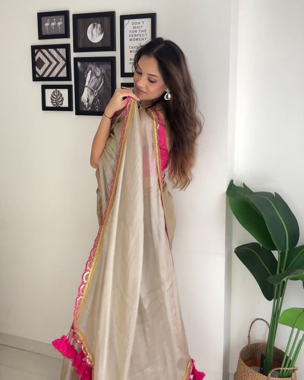 Luxurious Jimichu Tissue Saree with Sequence & Thread Butta Work Lace