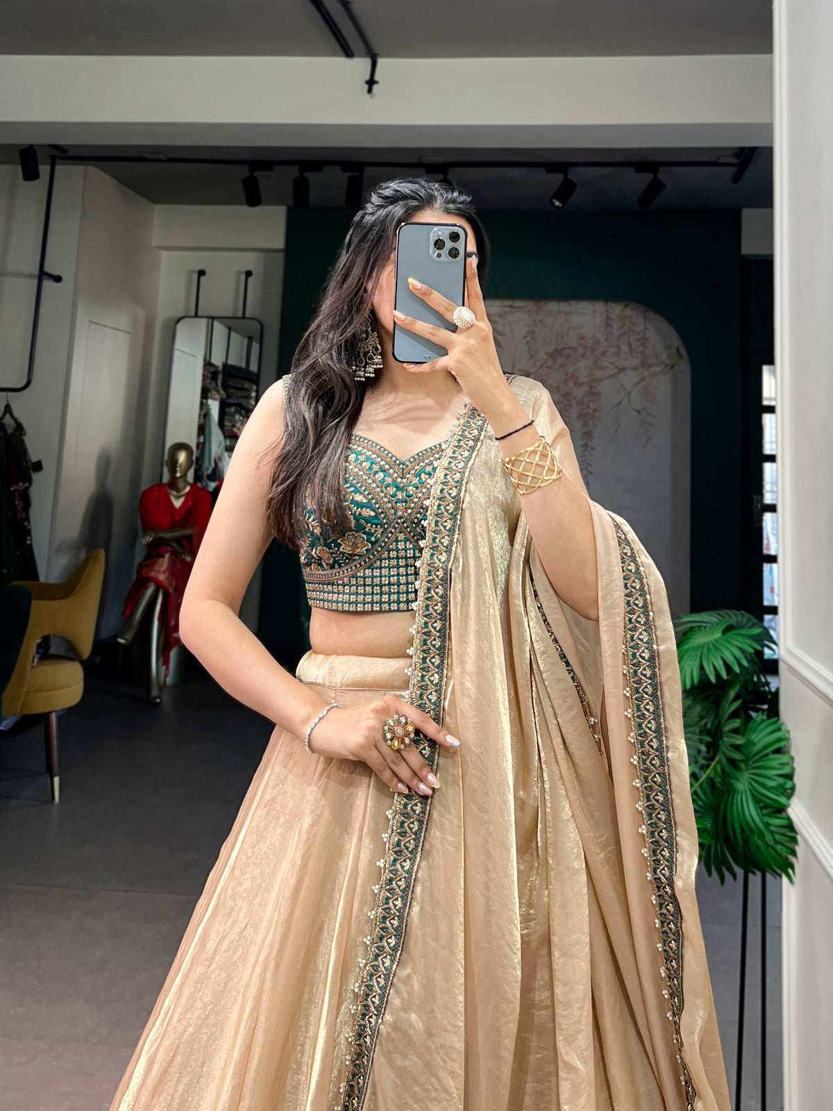 Zariya Muse Beige Fendi Lehenga Choli Set with Emerald Embroidered Blouse