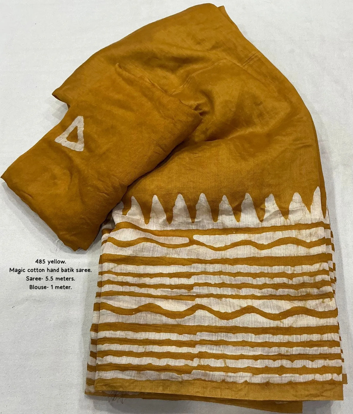 mustard tassel saree