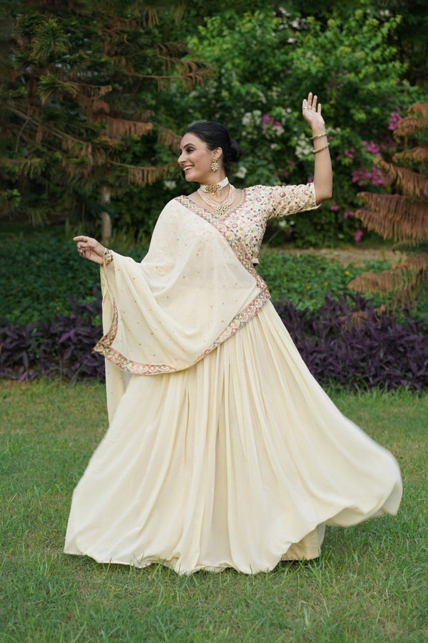 Capture Hearts in Off-White Embroidered Lehenga Choli