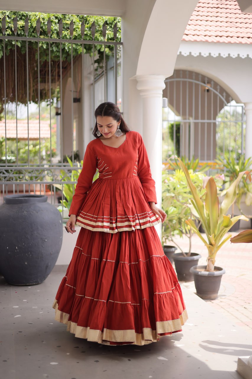 Rust Layered Cora Cotton Navratri Lehenga Set with Peplum Top