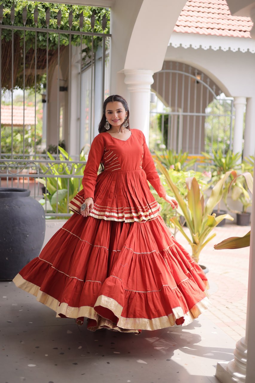 Rust Layered Cora Cotton Navratri Lehenga Set with Peplum Top