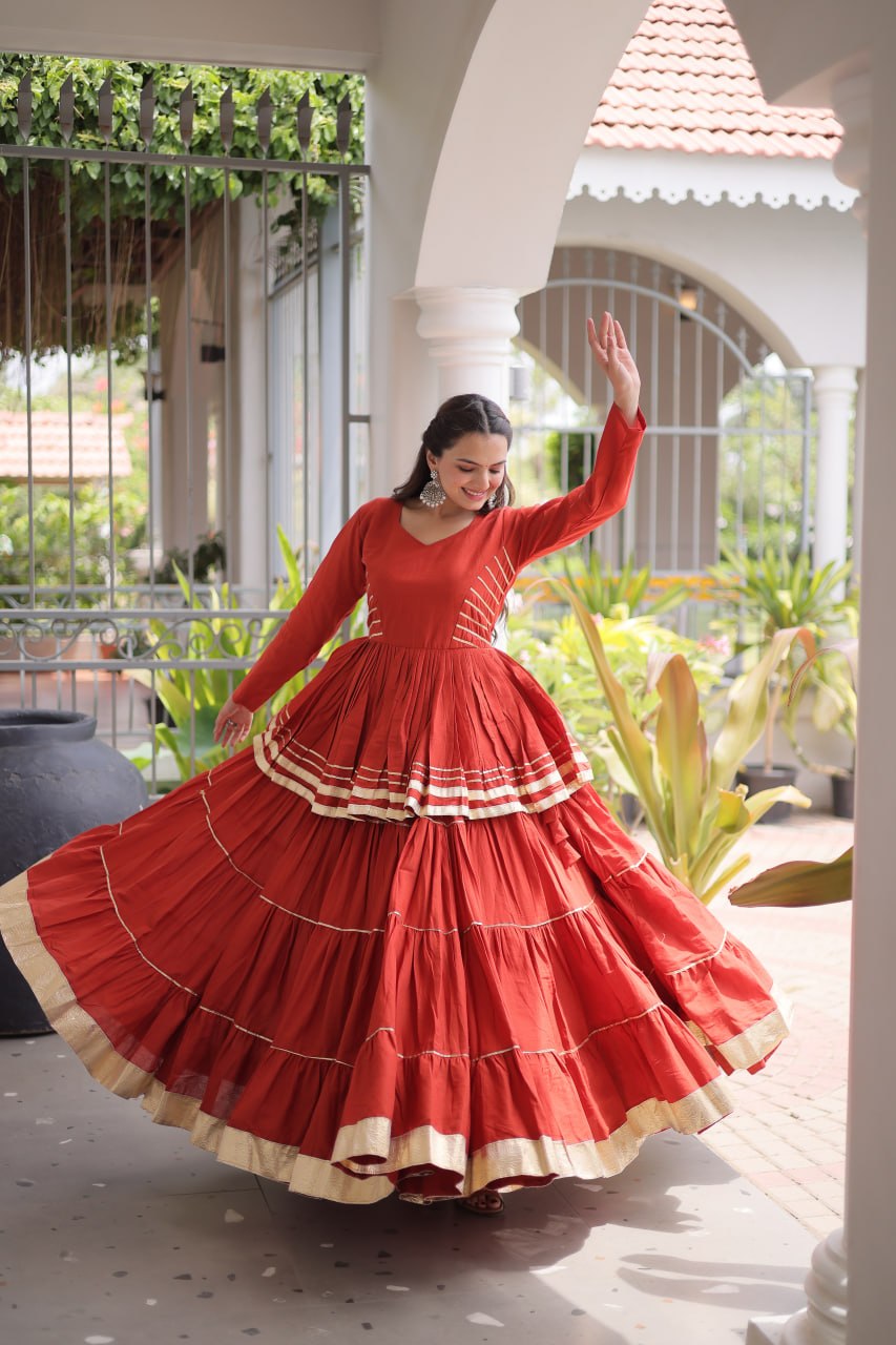 Rust Layered Cora Cotton Navratri Lehenga Set with Peplum Top