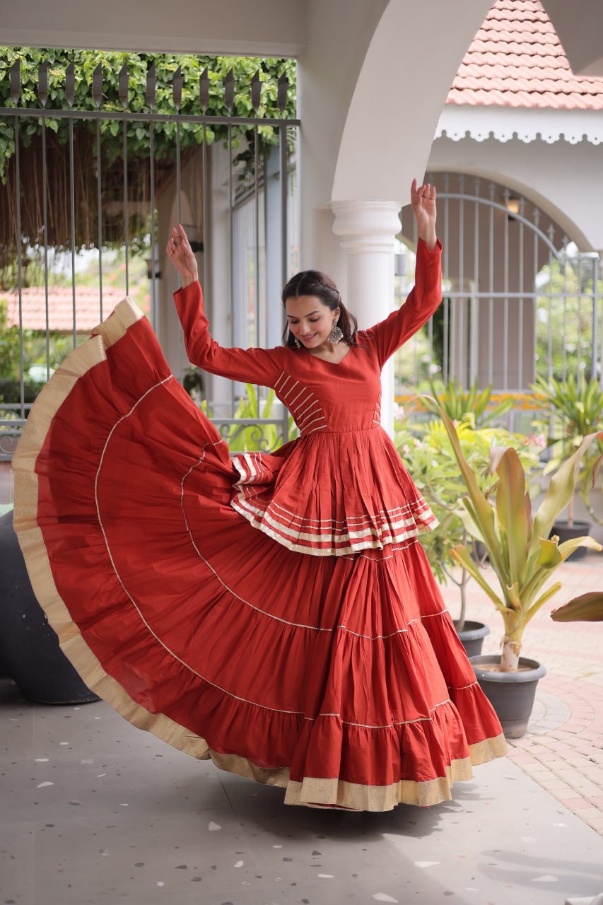 Rust Layered Cora Cotton Navratri Lehenga Set with Peplum Top