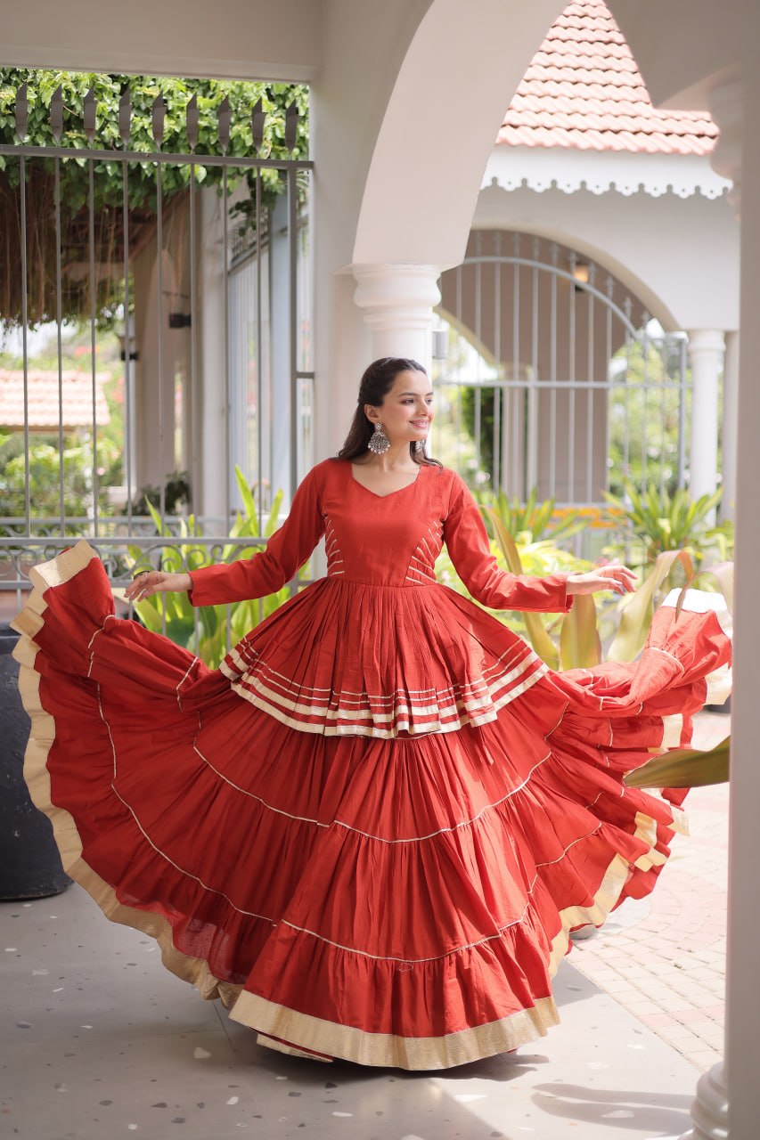 Rust Layered Cora Cotton Navratri Lehenga Set with Peplum Top