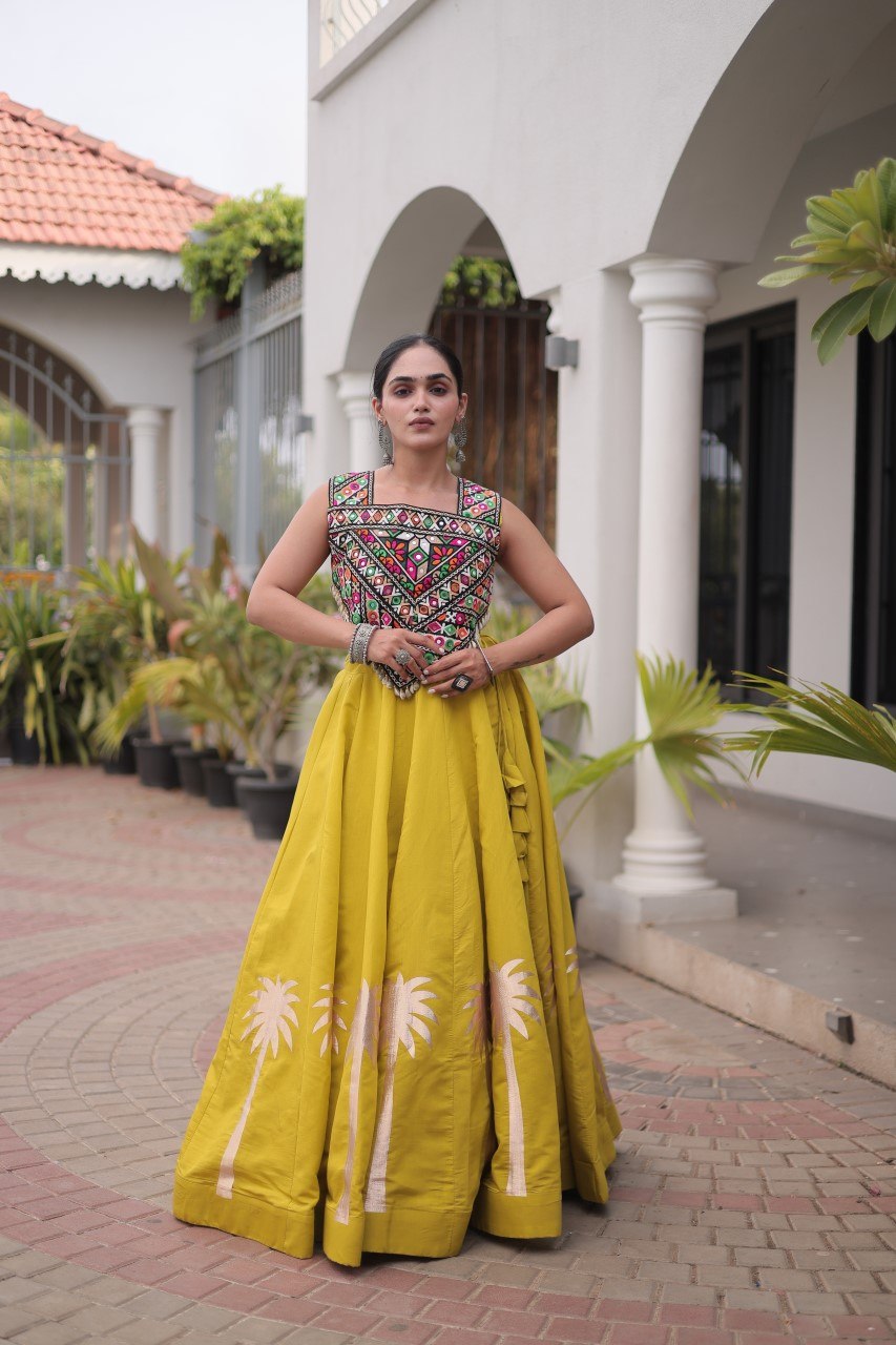 Yellow Navratri Lehenga Choli with Kutchi Gamthi Top