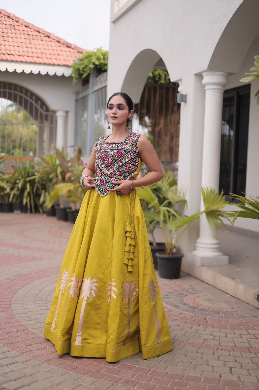 Yellow Navratri Lehenga Choli with Kutchi Gamthi Top