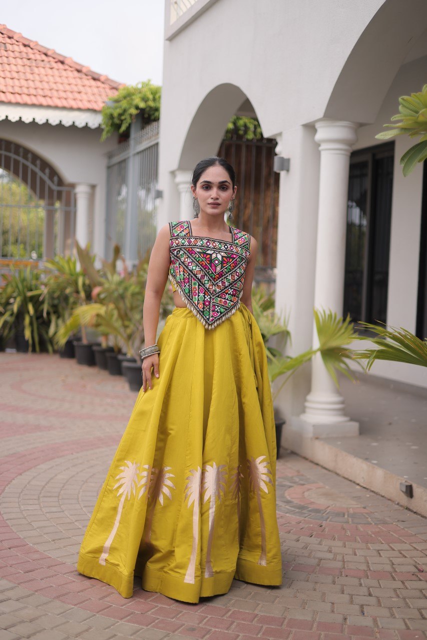 Yellow Navratri Lehenga Choli with Kutchi Gamthi Top