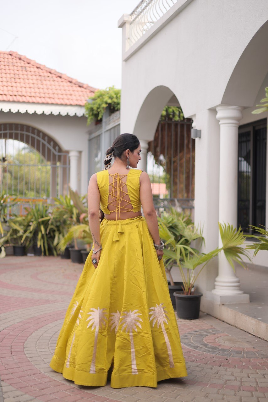 Yellow Navratri Lehenga Choli with Kutchi Gamthi Top