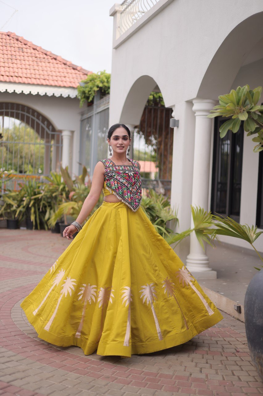 Yellow Navratri Lehenga Choli with Kutchi Gamthi Top