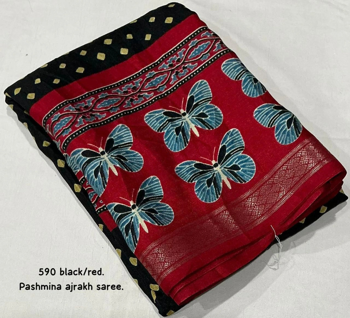 red pallu black saree